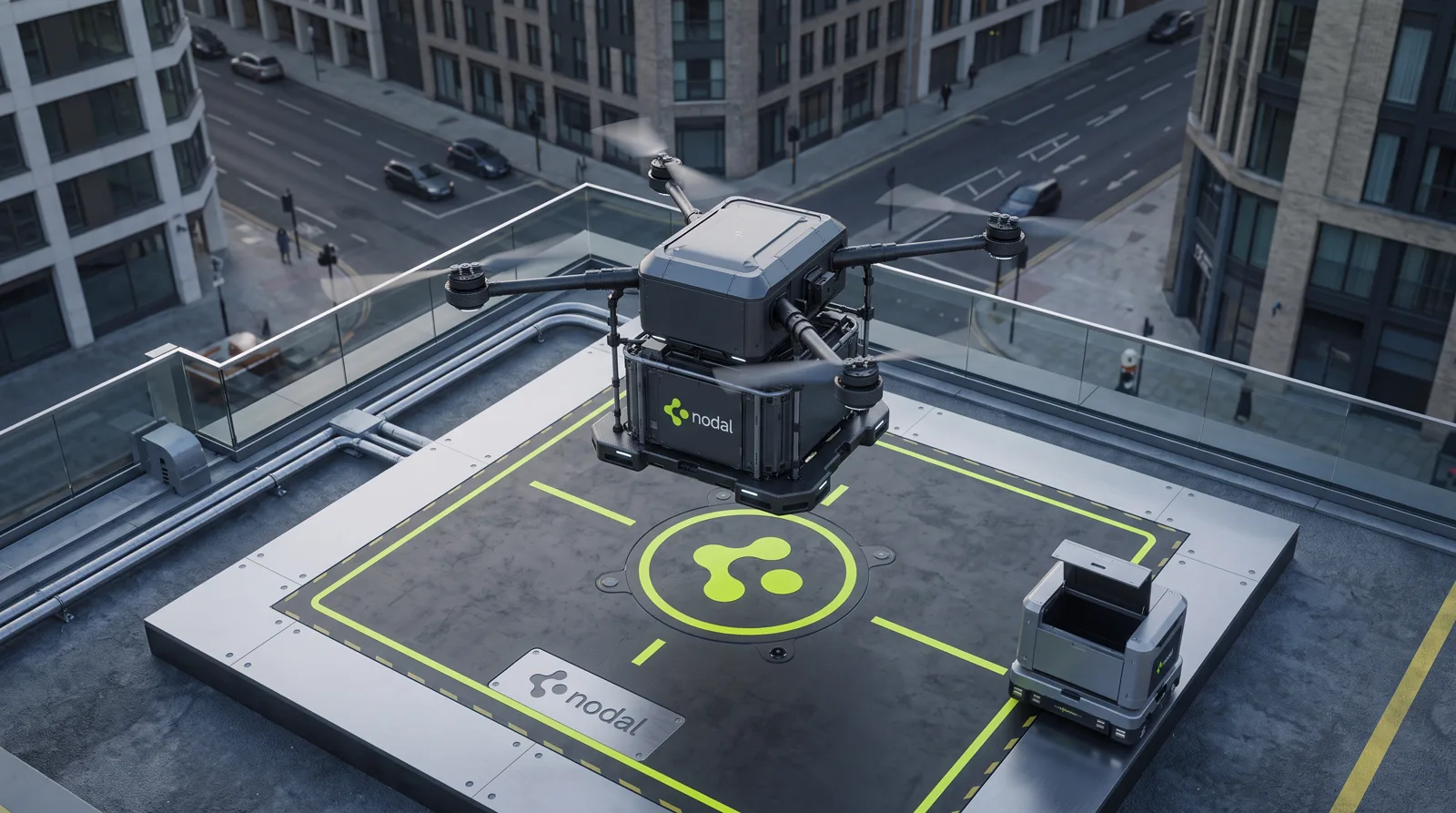 A NODAL drone carries the load over an elevated platform in an urban area.